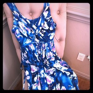 Long, floor length layered dress.